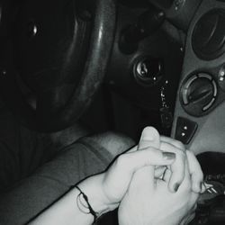 Cropped image of man holding hands