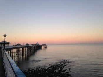 Sunset over llandudno pier