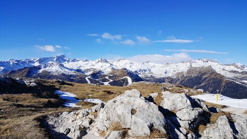 Scenic view of snowcapped mountains against sky