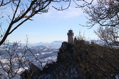 Scenic view of snow covered mountains against sky