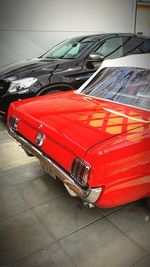 Red car parked in parking lot