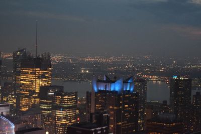 Illuminated cityscape at night