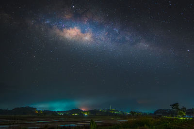 Scenic view of star field against sky at night