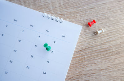 High angle view of paper on table
