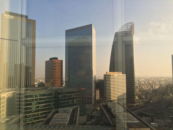 Low angle view of modern buildings against sky