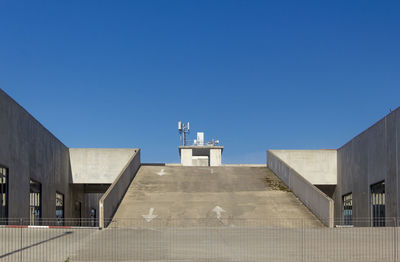 View of parking lot against clear sky