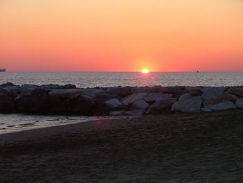 Scenic view of sea at sunset