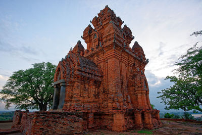 Low angle view of temple against sky