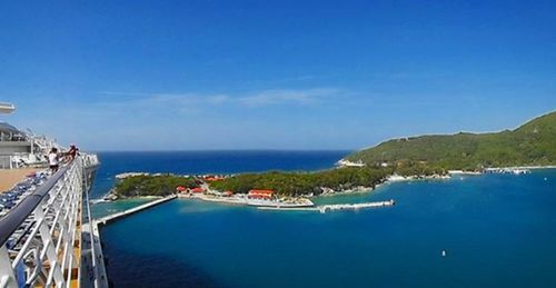 Scenic view of sea against blue sky