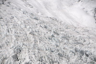 Full frame shot of snow covered rock