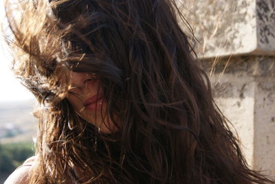 Portrait of woman with tousled hair