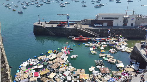 High angle view of boats moored in harbor