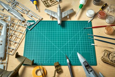 High angle view of toy with paintbrush on table