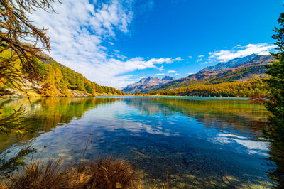 Lake sils maria, in the engadine, photographed in autumn, with landscape and mountains above it.