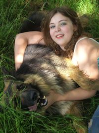 Portrait of young woman with dog