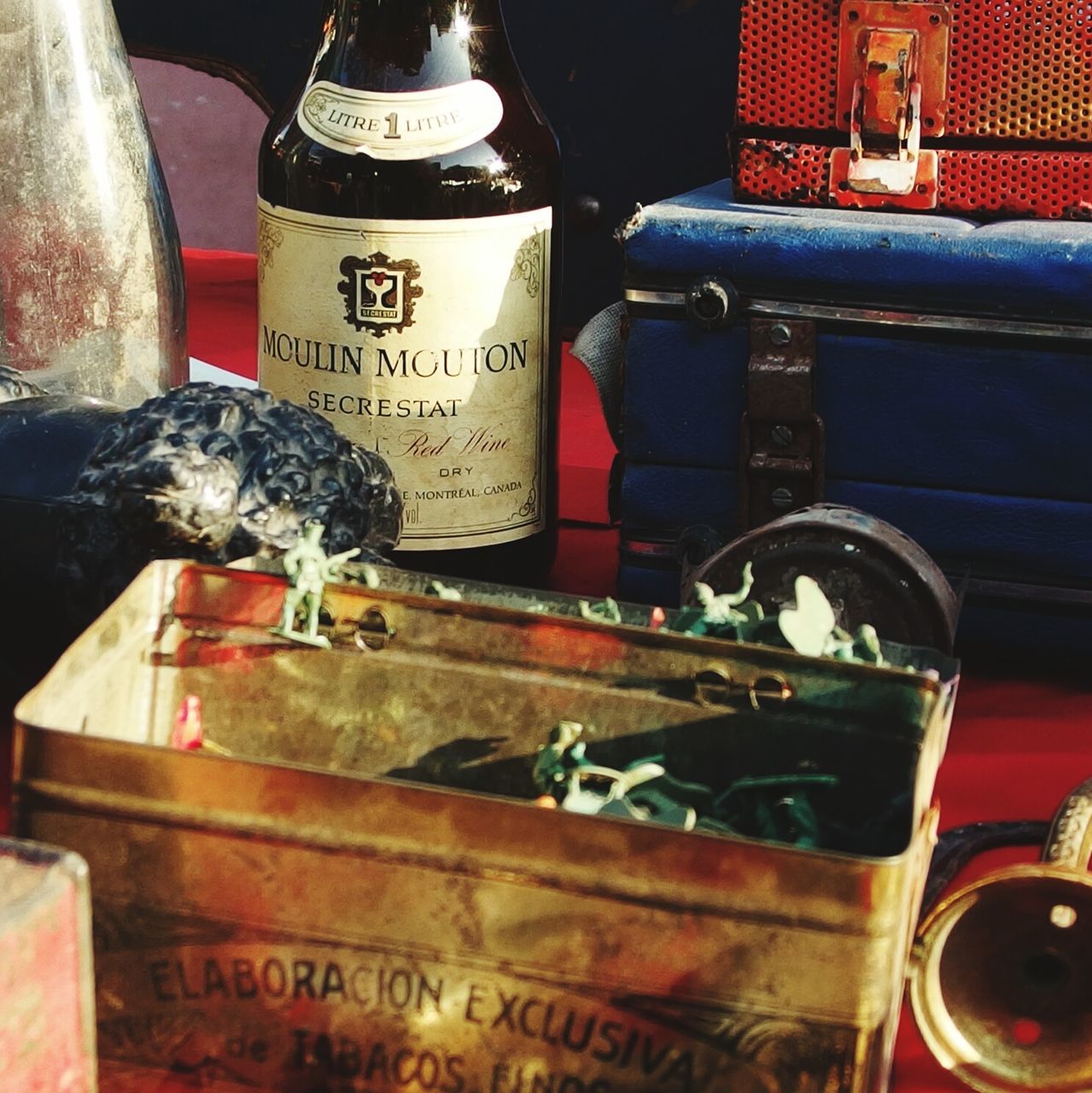 indoors, text, communication, still life, retail, variation, western script, close-up, old, store, shelf, container, no people, choice, for sale, old-fashioned, non-western script, antique, metal, table