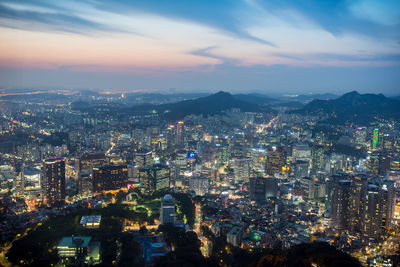 Aerial view of cityscape at night