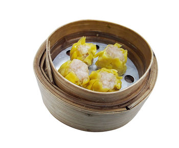 High angle view of food in bowl on white background