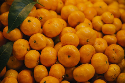 Full frame shot of oranges at market stall