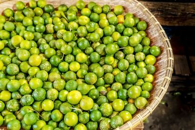 High angle view of green fruits in market