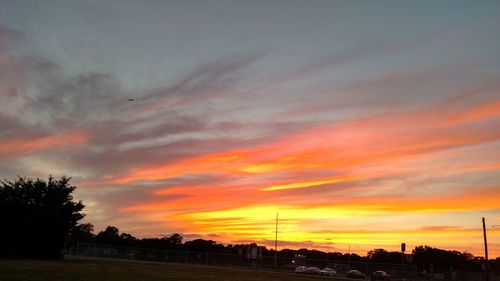 Scenic view of dramatic sky during sunset