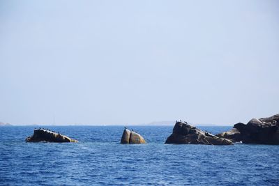 Scenic view of sea against clear sky