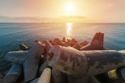 Scenic view of sea against sky during sunset