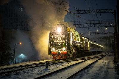 Railroad tracks at night