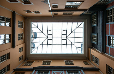 Low angle view of skylight in building