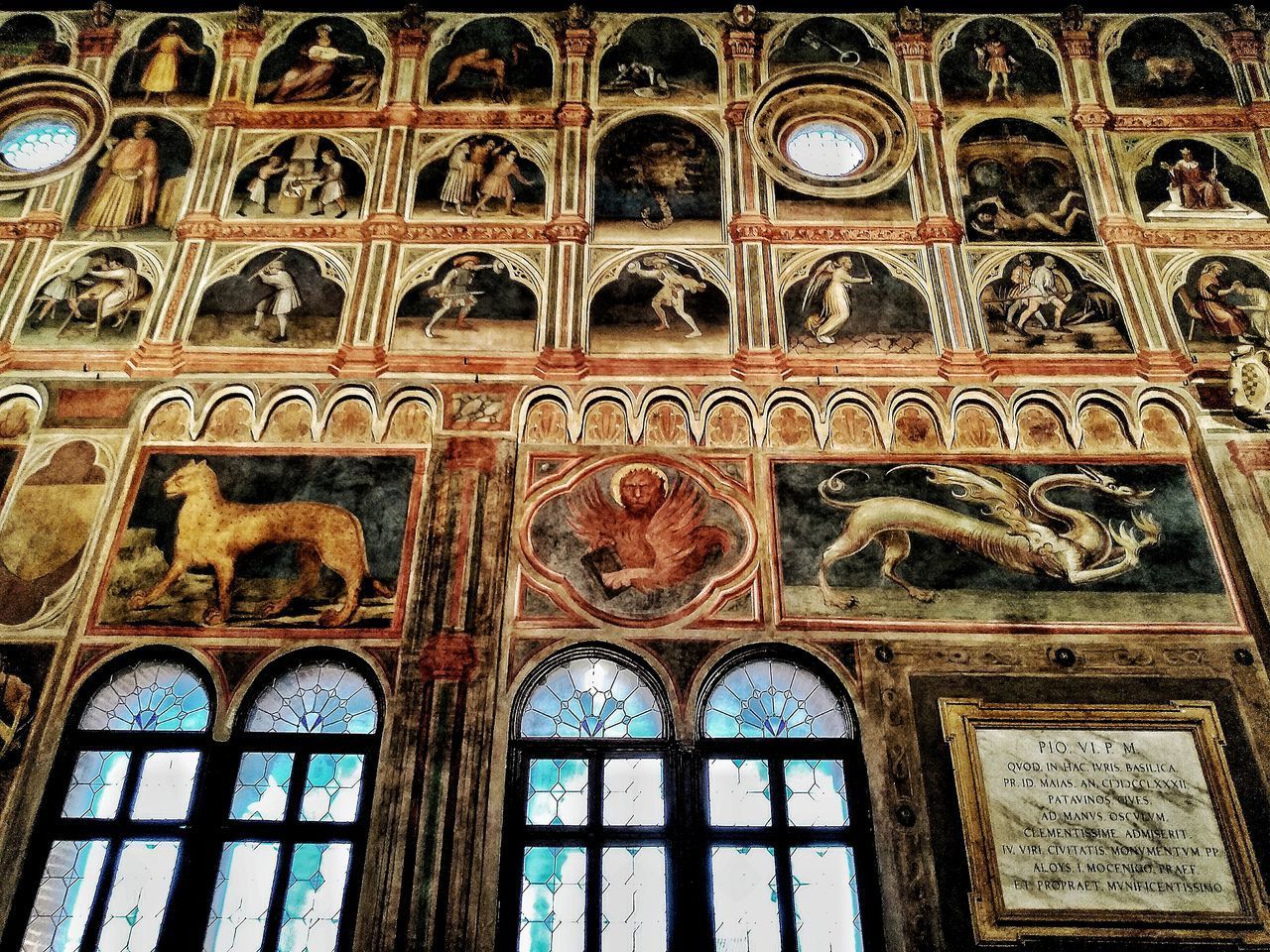 LOW ANGLE VIEW OF STAINED GLASS IN BUILDING