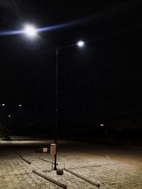 Illuminated street light at night