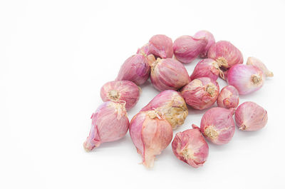 Close-up of blueberries against white background