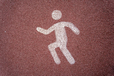 A sign of a running man