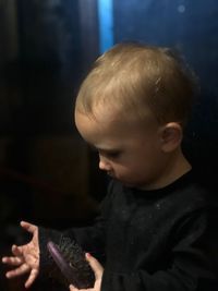 Close-up portrait of boy looking at camera