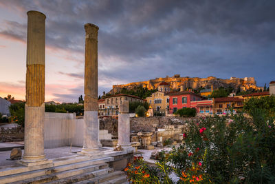 Remains of hadrian's library and acropolis in the old town of athens.