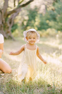 Portrait of cute girl playing in park