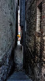 Walkway amidst buildings