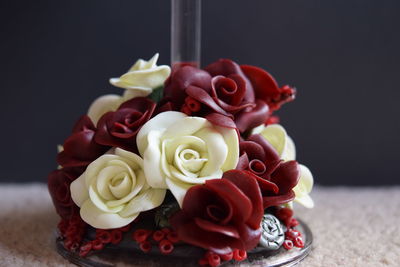 Close-up of rose decoration on wine glass