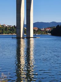 View of bridge over river against sky