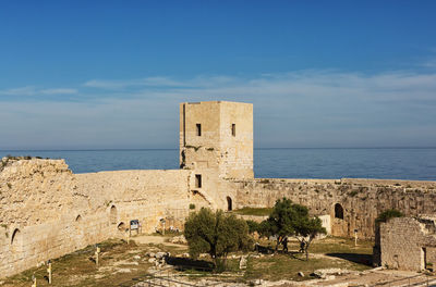 View of fort against cloudy sky