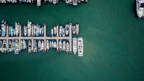 Aerial view of boats moored at harbor