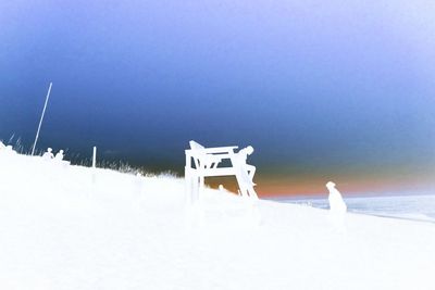 Scenic view of sea against sky during winter