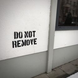 Close-up of text on wall