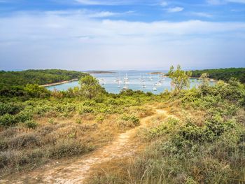 Scenic view of land against sky