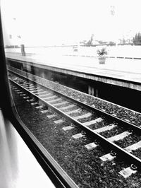 Railroad tracks against clear sky