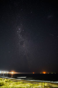 Scenic view of field against sky at night in uruguay.