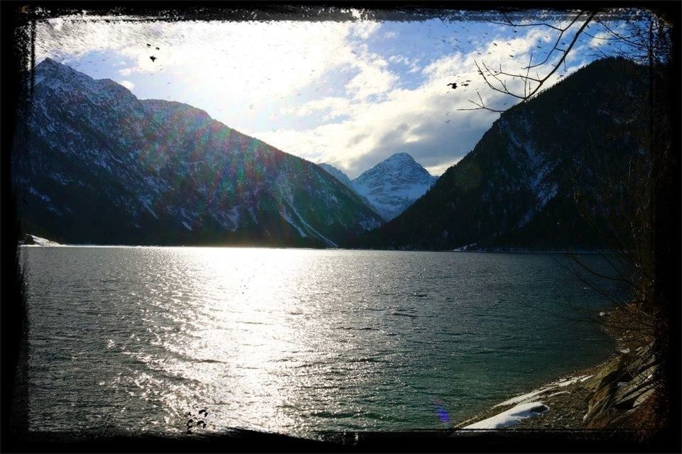 mountain, transfer print, water, tranquil scene, mountain range, scenics, tranquility, lake, beauty in nature, sky, auto post production filter, nature, waterfront, idyllic, rippled, reflection, cloud, cloud - sky, non-urban scene, outdoors