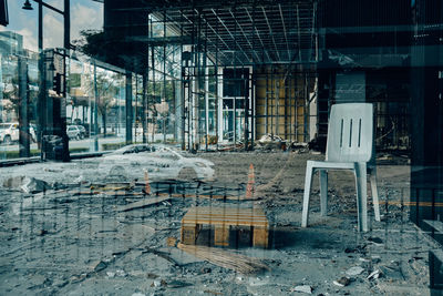 Abandoned building at construction site in city