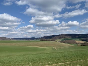 Scenic view of agricultural field against sky  in eichsfeld, thuringia, germany