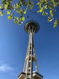 Low angle view of tower against clear blue sky